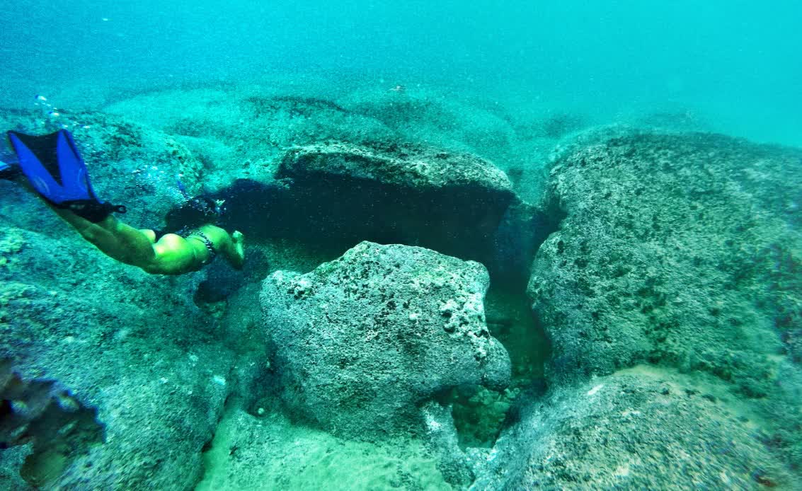 Freediver over reef